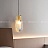 Дизайнерский подвесной светильник с белым плафоном в скругленном хрустальном слитке NELLY фото 5