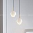 Серия подвесных светильников с разнотипными фигурными плафонами округлой формы из белого мрамора MIEL A фото 7